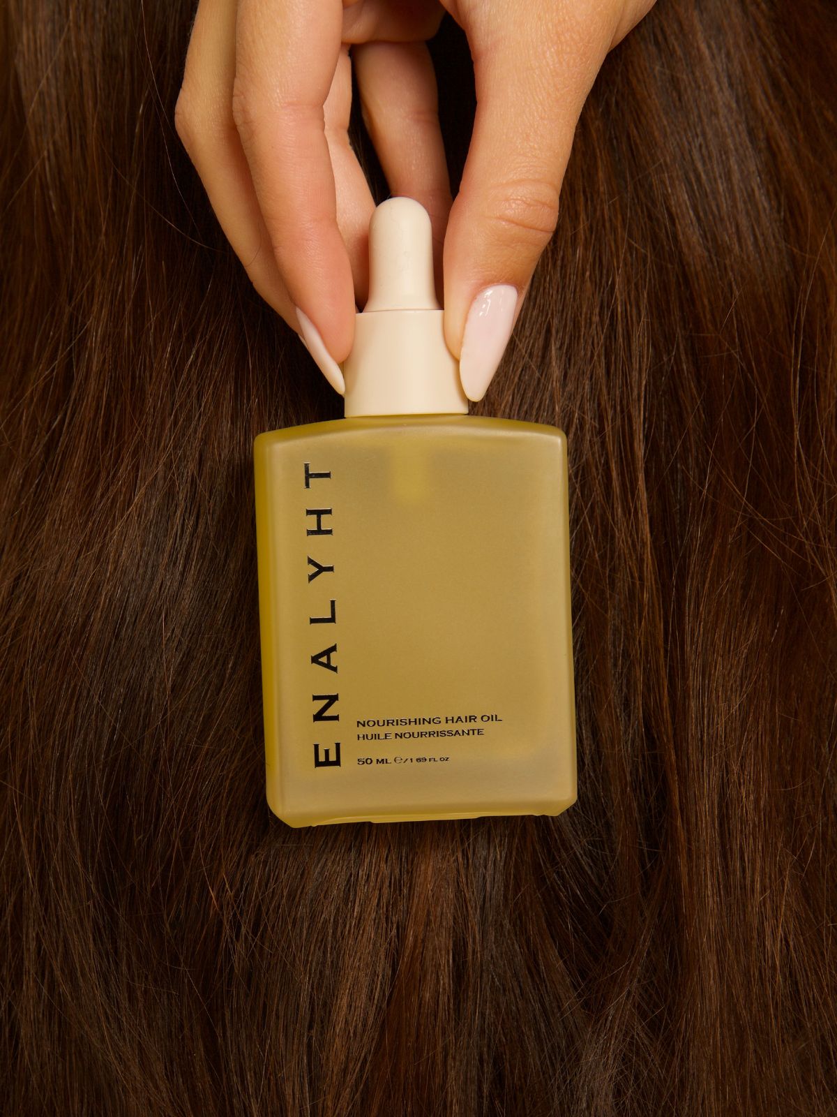 Nourishing and repairing hair oil